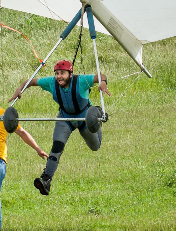 Hang gliding student smiling during a training flight